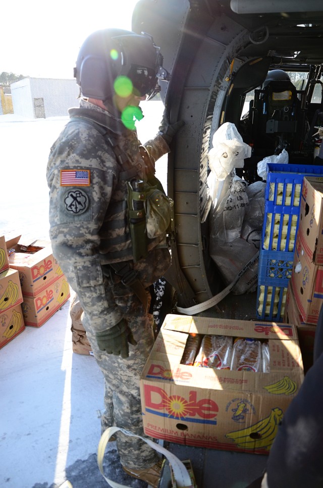 Virginia National Guard aviators deliver supplies to iced-in Tangier Island