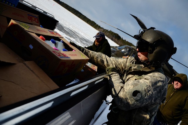 Virginia National Guard aviators deliver supplies to iced-in Tangier Island