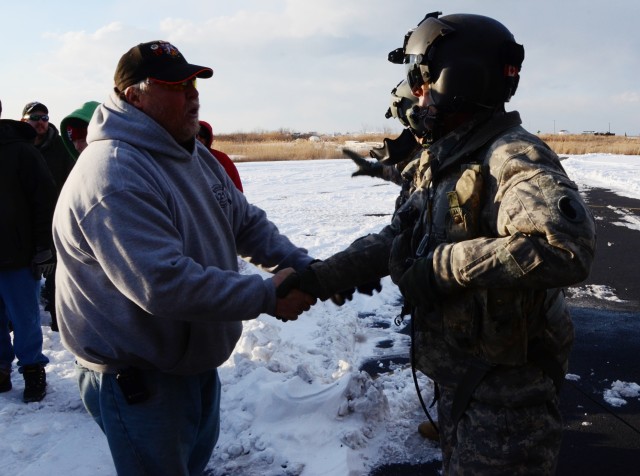 Virginia National Guard aviators deliver supplies to iced-in Tangier Island