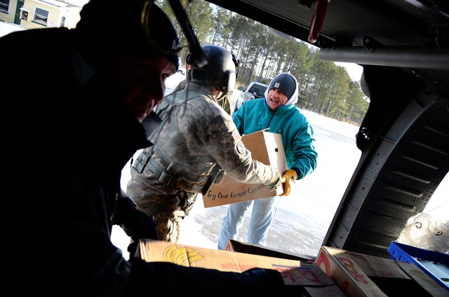 Virginia National Guard aviators deliver supplies to iced-in Tangier Island