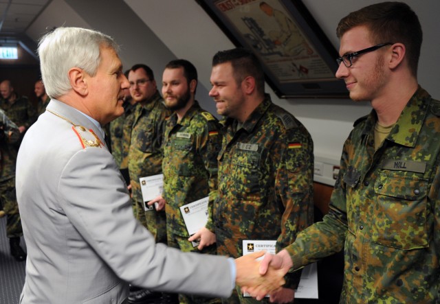 German Soldiers on target, receive US marksmanship badges