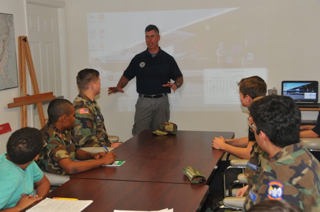 Taking wing:  U.S. Army Yuma Proving Ground engineer volunteers with budding pilots