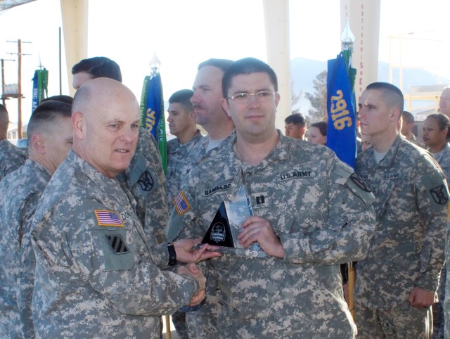 FORSCOM DCG Lt. Gen. Patrick J. Donahue presents avaiation safety award to 2916th Aviation Battalion's Charlie Company