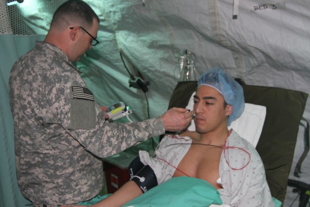 121st Combat Support Hospital Conducts Live Surgery in the field
