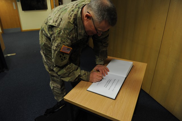 Innsworth&mdash; Maj. Gen. Paul LaCamera, commander, 4th Infantry Division signed the distinguished guest visitor's book during his visit to Headquarters Allied Rapid Reaction Corps, (HQ ARRC), March