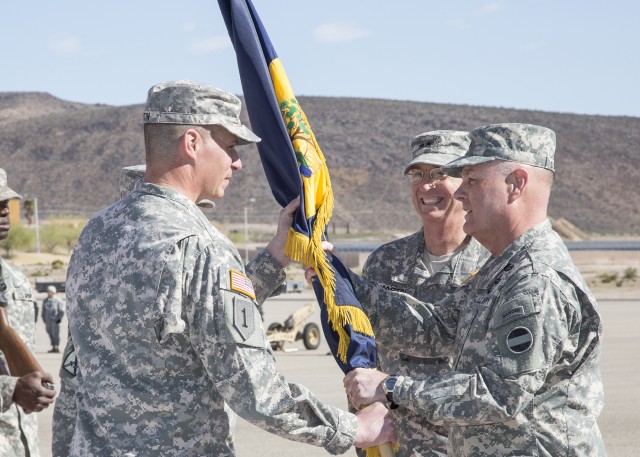 Brig. Gen. Joseph Martin receives NTC colors from Lt. Gen. Patrick Donahue II, deputy commanding general of United States Army Forces Command
