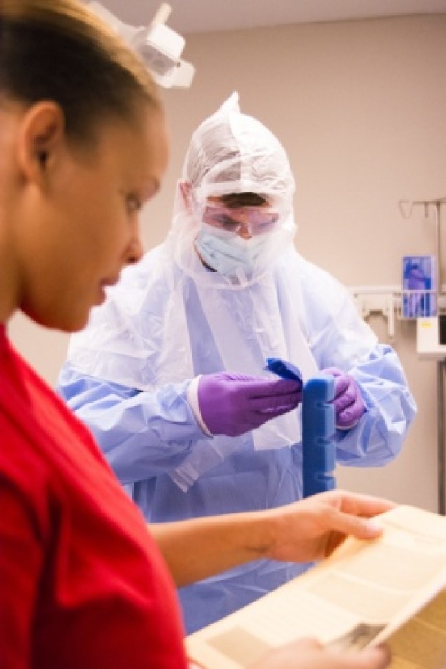 Donning simulated Ebola personal protective equipment