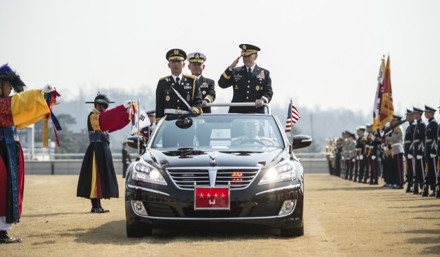 Gen. Dempsey revuews triios in Korea