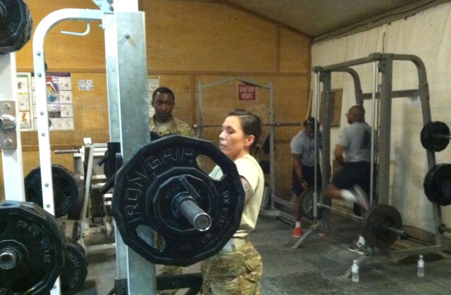 Fort Drum team member lifts a heavy load in Afghanistan