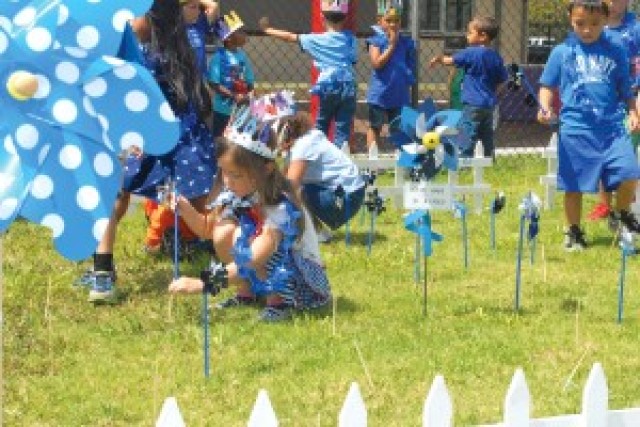 Proclamation and pinwheels pledge child abuse awareness