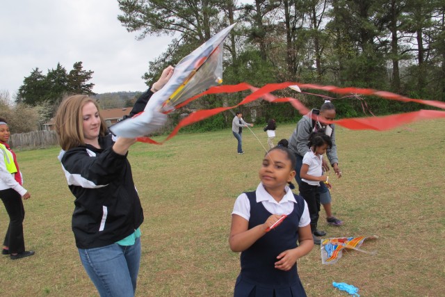 Energy team flies kites to teach local students