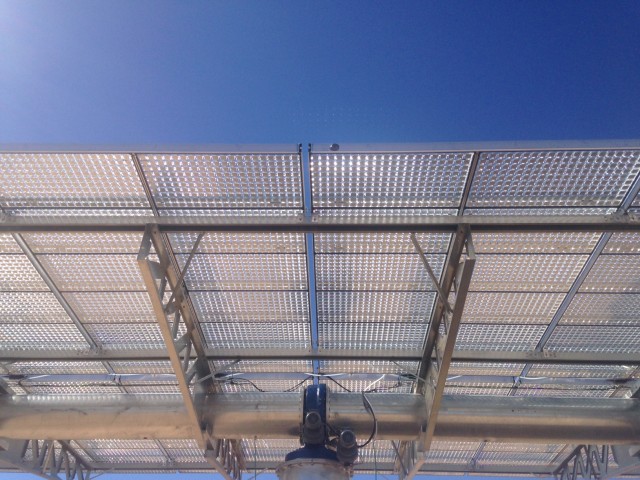 Closeup of 1-megawatt concentrated solar photo voltaic farm panel.