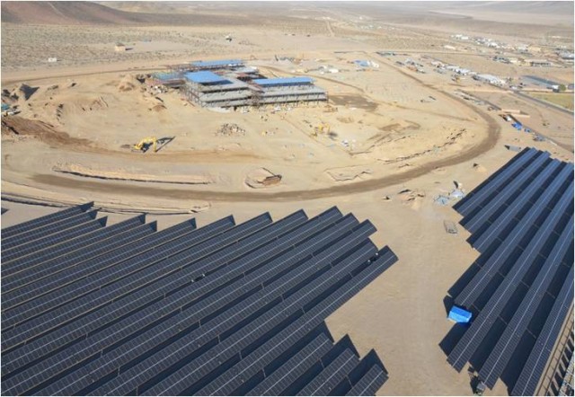 Aerial view of the 20-acre solar farm for Fort Irwin's new hospital under construction