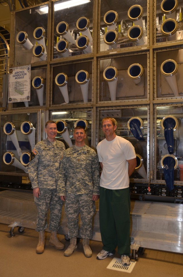 Chaplain (Col.) Mark A. Penfold, Army Test and Evaluation Command and Chaplain (Maj.) Bernard Cornell of Dugway Proving Ground inside the Life Sciences Whole System Live Agent Test chamber March 16.