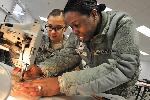 Clothing repair taught for final time at Quartermaster School