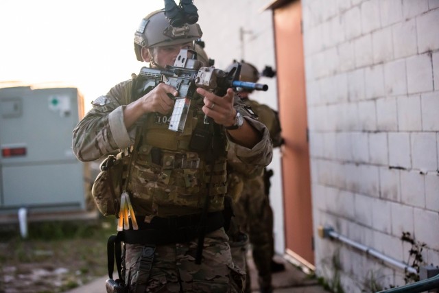 SF Soldiers Assault Island Outpost
