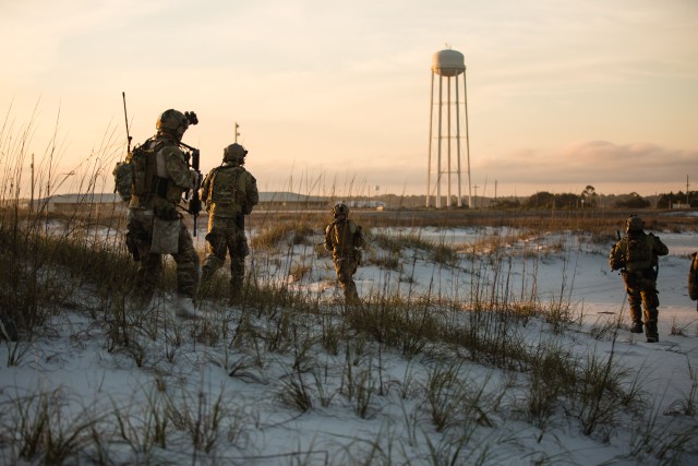 SF Soldiers Assault Island Outpost