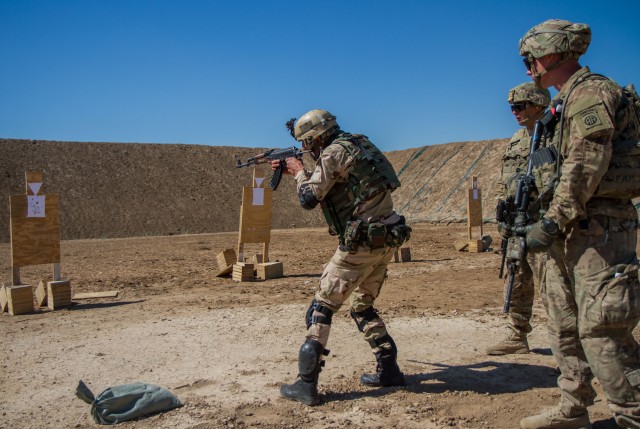 Iraqi soldier takes aim at target