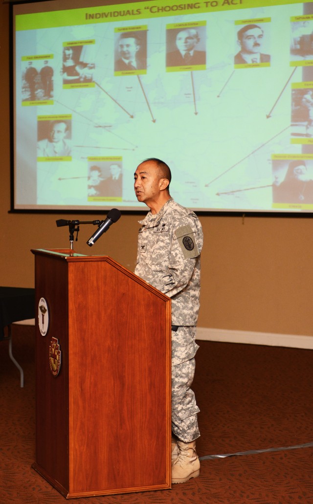 Col. Todd Kimura, commander of Dental Clinic Command here, speaks at Days of Remembrance ceremony
