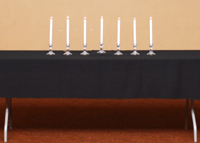Seven candles in honor of the victims of the Holocaust