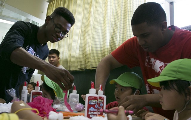 Marines, Okinawa residents share traditions during USO Easter celebration