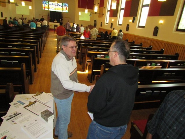 Greeting the churchgoers