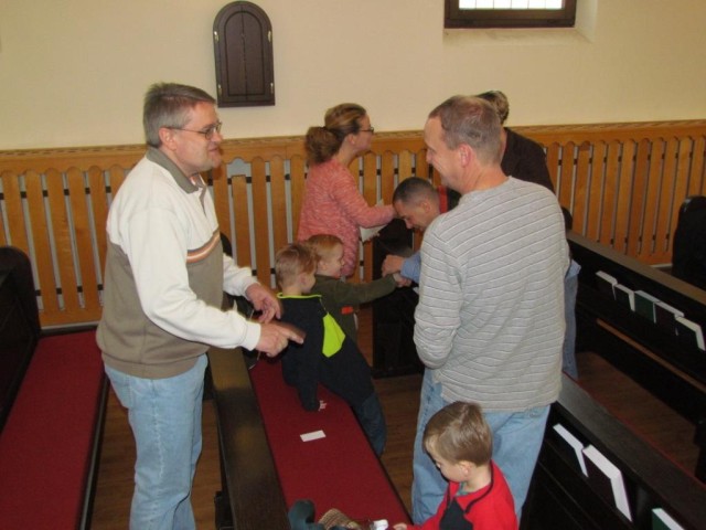 Greeting the churchgoers