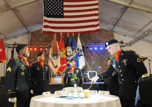 Soldiers of the 916th Sustainment Brigade at Fort Irwin, Calif., conduct a Missing Man Ceremony