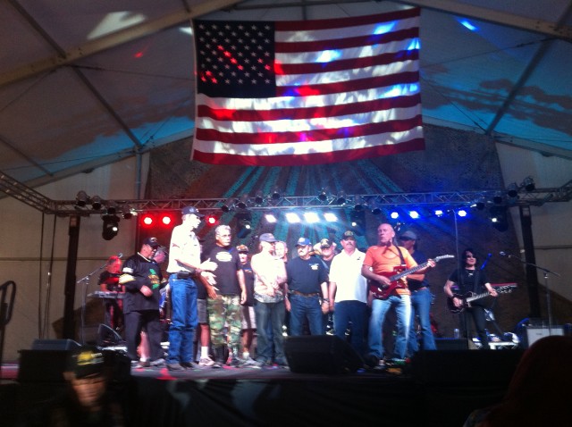 Vietnam Veterans join Mark Farner, former lead singer/guitarist of Grand Funk Railroad, on stage