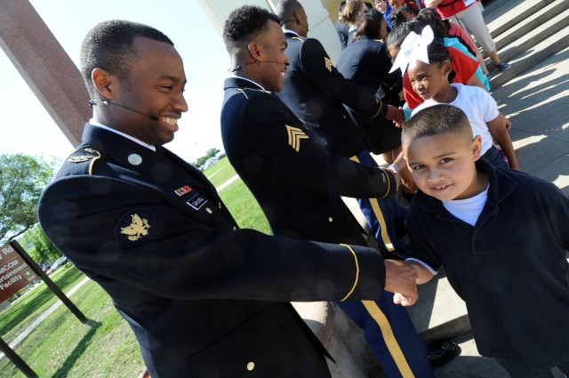 Soldier Show cast members meet and greet Camelot Elementary School students