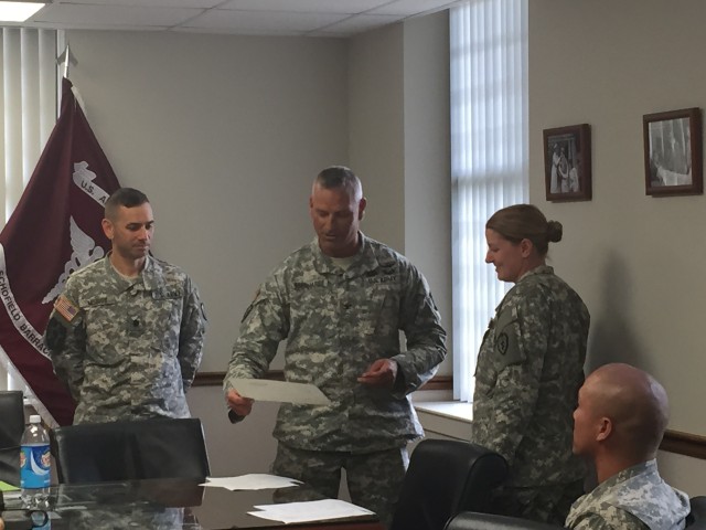 Col. Eberhardt recognizes Maj. Giorio for her contributions to patient safety