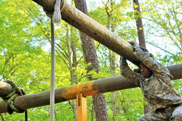 Obstacles are no problem for Staff Sgt. Dominique Curry in 597th Trans. Bde Best Warrior competition