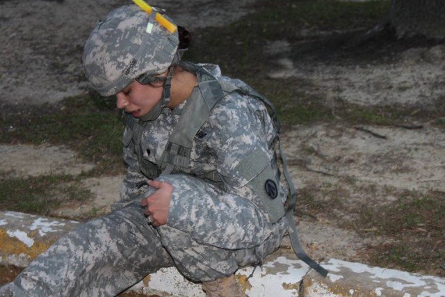 Spc. Austi-Ana Lamb catches her breath during 597th Trans. Bde. Best Warrior competition