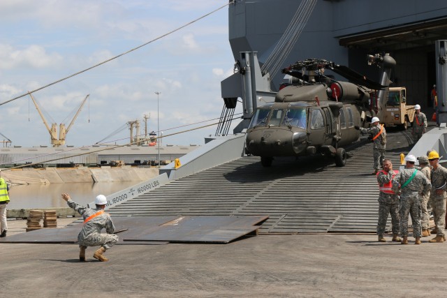 Helicopters being unloaded from the USNS Mendonca at the Port of Beaumont, Texas.
