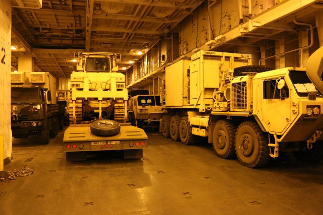 25th ID vehicles wait to be unloaded from the USNS Mendonca at the Port of Beaumont, Texas.