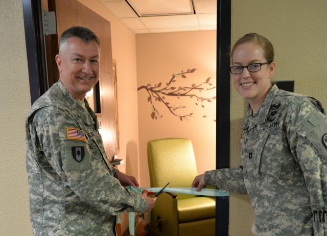 Commander severs the ribbon