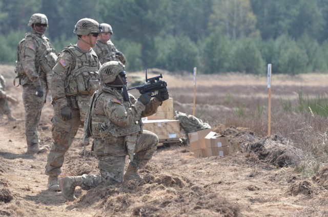 Allied troops share knowledge, skills during weapons range
