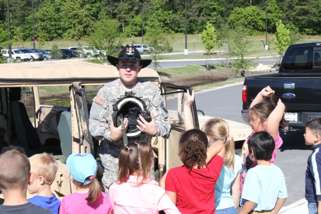 Paratroopers celebrate the last day of the Month of the Military Child