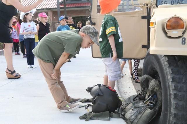 Paratroopers celebrate the last day of the Month of the Military Child