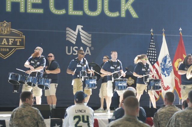 Army Spc. Williams plays with the Seahawks Band