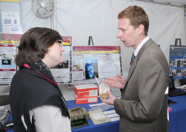CCCRP  Deputy Director speaks to visitor at DOD Lab Day