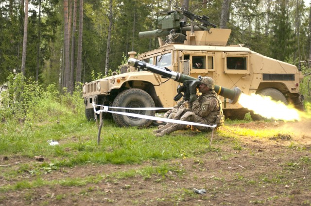 Estonian Defense Force soldier fires U.S. weapon