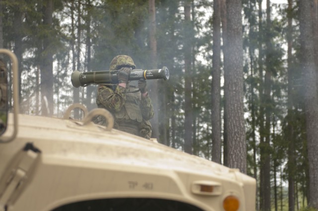 Estonian Defense Force soldier fires U.S. weapon