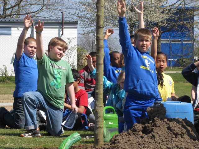 Students raise hands