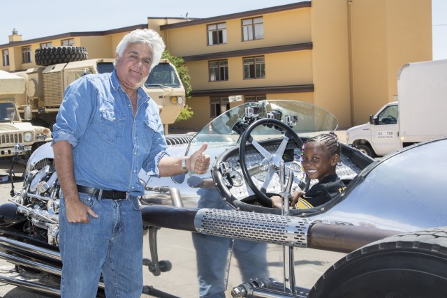 Jay Leno and Kamani Cooper, 8, a military family member here