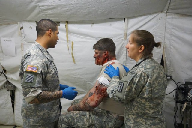 EMT personnel with patients with realistc moulage injuries