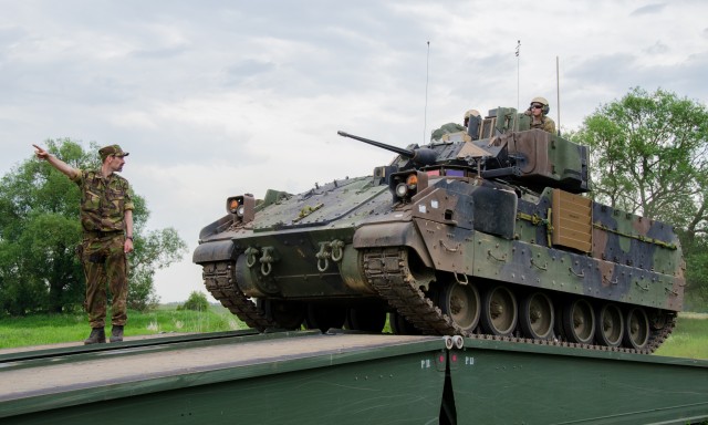 Multinational units conduct assault river crossing operations