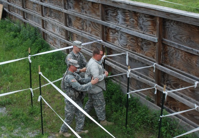 New York Army National Guard Soldiers hone detainee operations skills at Fort Drum