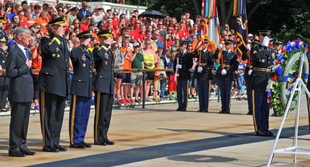 Saluting as Taps is Played