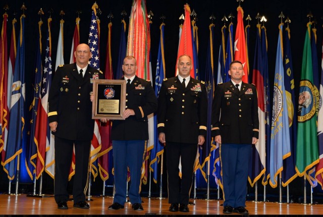 Grubbs accepts Army Award for Maintenance Excellence
